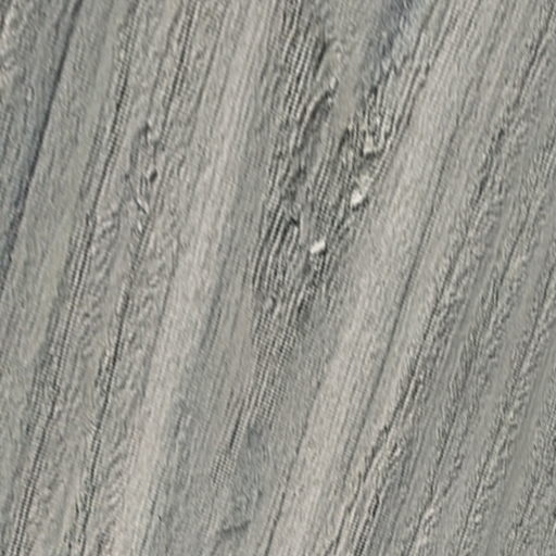 AmeriDex Beachwood variegated cellular PVC deck board color sample